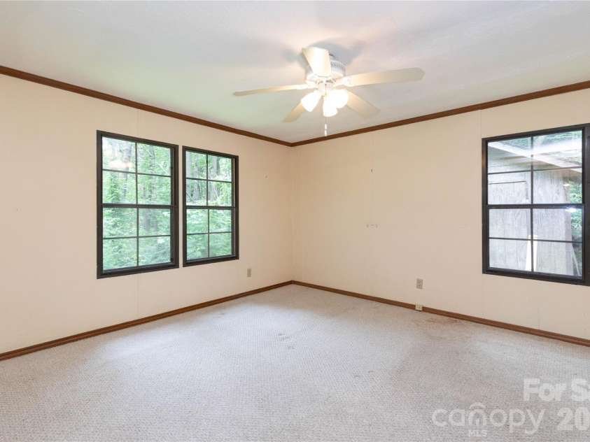 1010 Sharon Ridge Road, Fairview, NC 28730.  MLS# CAR4379788, YatesRealty ID 27153. Primary bedroom