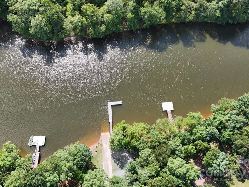 343 Cove Wood Drive, Denton, NC 27239.  MLS# CAR4282287, YatesRealty ID 27156. Community boat launch and pier.