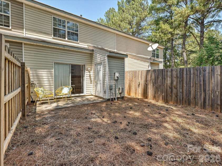 12307 Bluestem Lane, Charlotte, NC 28277.  MLS# CAR4382892, YatesRealty ID 27159. Private Fenced Back Yard