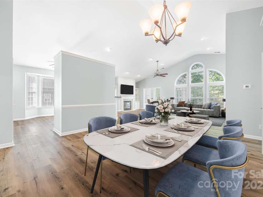 870 Platinum Drive, Fort Mill, SC 29708.  MLS# CAR4272667, YatesRealty ID 27159. Virtually Staged Dining, Living and Sun Room