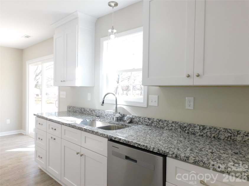 218 McClain Street, York, SC 29745.  MLS# CAR4325787, YatesRealty ID 2716. Granite cabinet tops throughout home