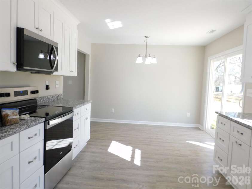 218 McClain Street, York, SC 29745.  MLS# CAR4325787, YatesRealty ID 2716. Kitchen & dining area