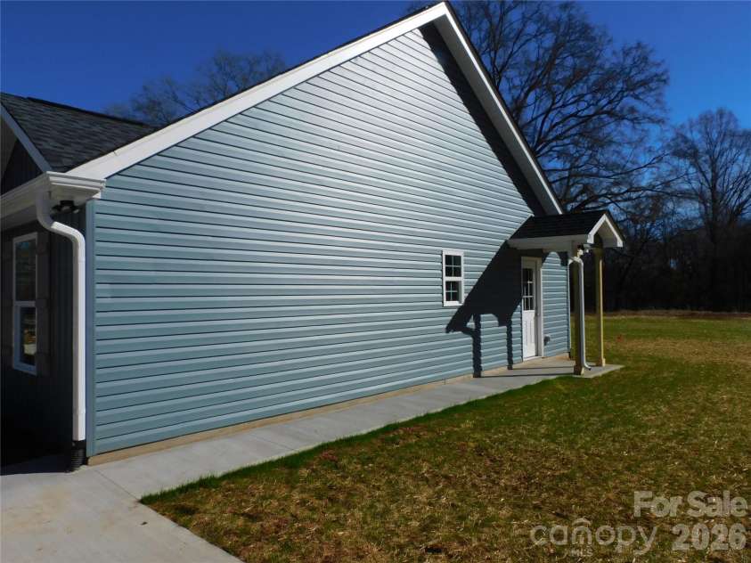 218 McClain Street, York, SC 29745.  MLS# CAR4325787, YatesRealty ID 2716. Side view & entrance