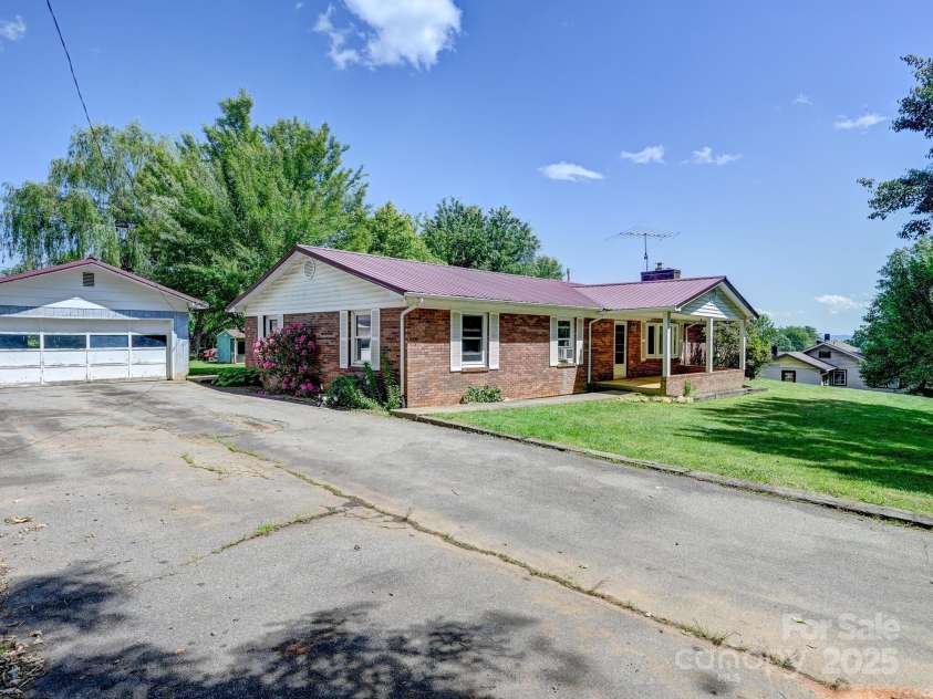 522 Bailey Mountain Road, Mars Hill, NC 28754.  MLS# CAR4260216, YatesRealty ID 27162. Front Angle