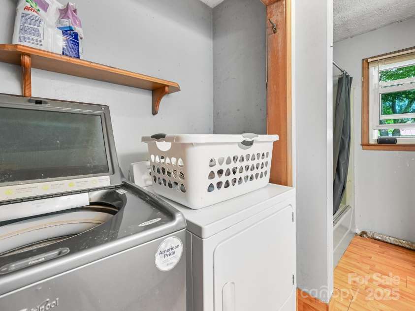 522 Bailey Mountain Road, Mars Hill, NC 28754.  MLS# CAR4260216, YatesRealty ID 27162. Laundry in Second Bath