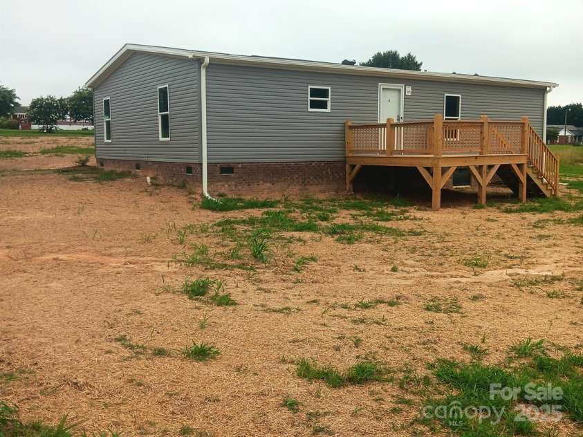 104 Advent Drive, Grover, NC 28073.  MLS# CAR4255581, YatesRealty ID 27164. Rear & Right Side