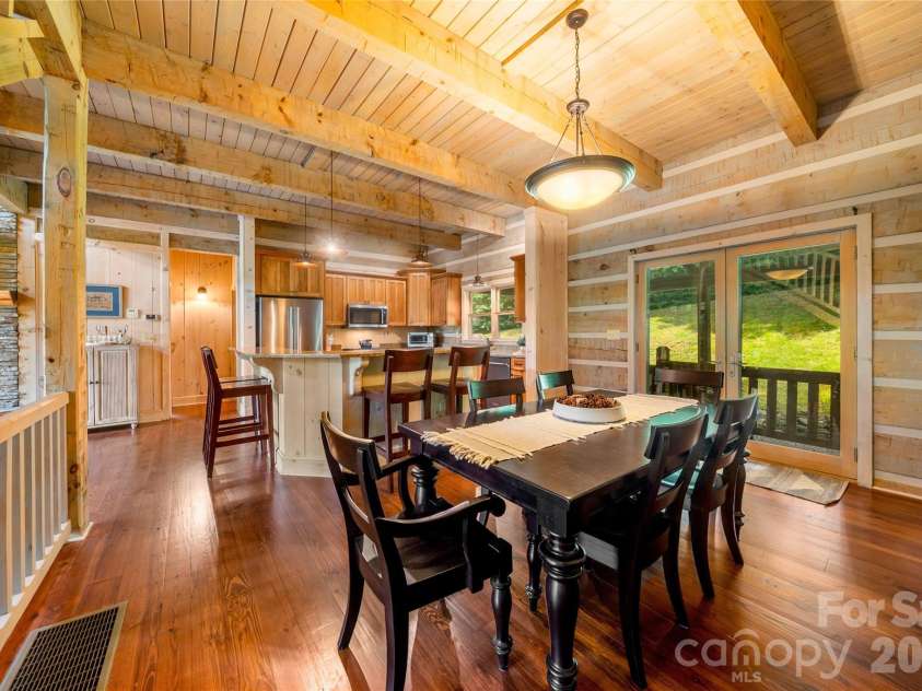 170 Cradling Cove, Waynesville, NC 28785.  MLS# CAR4387872, YatesRealty ID 27165. Dining area is convenient to the kitchen