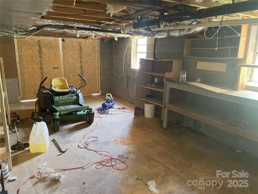 148 Pratt Lane, Statesville, NC 28625.  MLS# CAR4270751, YatesRealty ID 27166. Basement Workshop