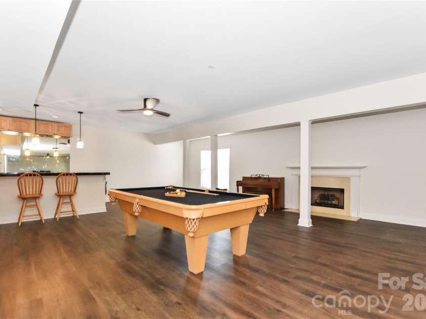 8127 Grahamson Lane, Charlotte, NC 28269.  MLS# CAR4346437, YatesRealty ID 27166. Basement Rec Room 