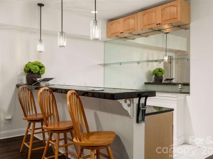 8127 Grahamson Lane, Charlotte, NC 28269.  MLS# CAR4346437, YatesRealty ID 27166. Basement Wet Bar
