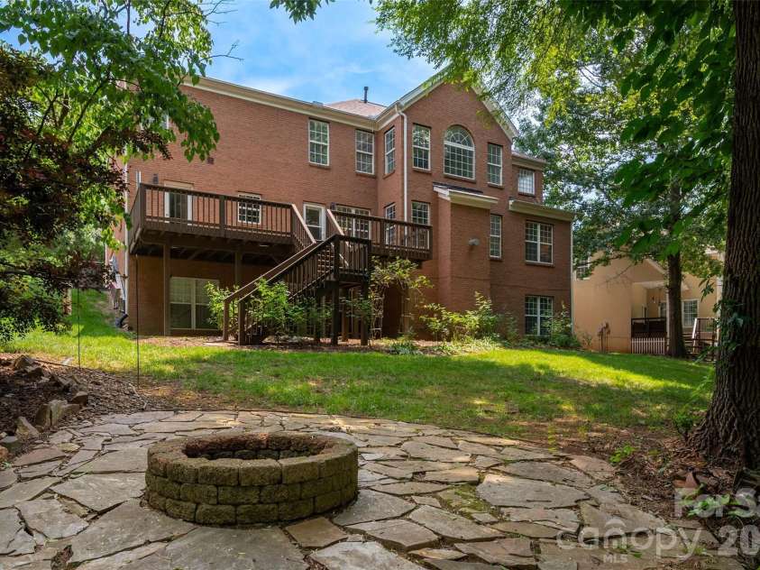8127 Grahamson Lane, Charlotte, NC 28269.  MLS# CAR4346437, YatesRealty ID 27166. Fire Pit