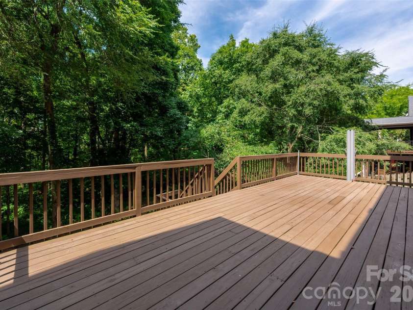 8127 Grahamson Lane, Charlotte, NC 28269.  MLS# CAR4346437, YatesRealty ID 27166. Oversized Deck