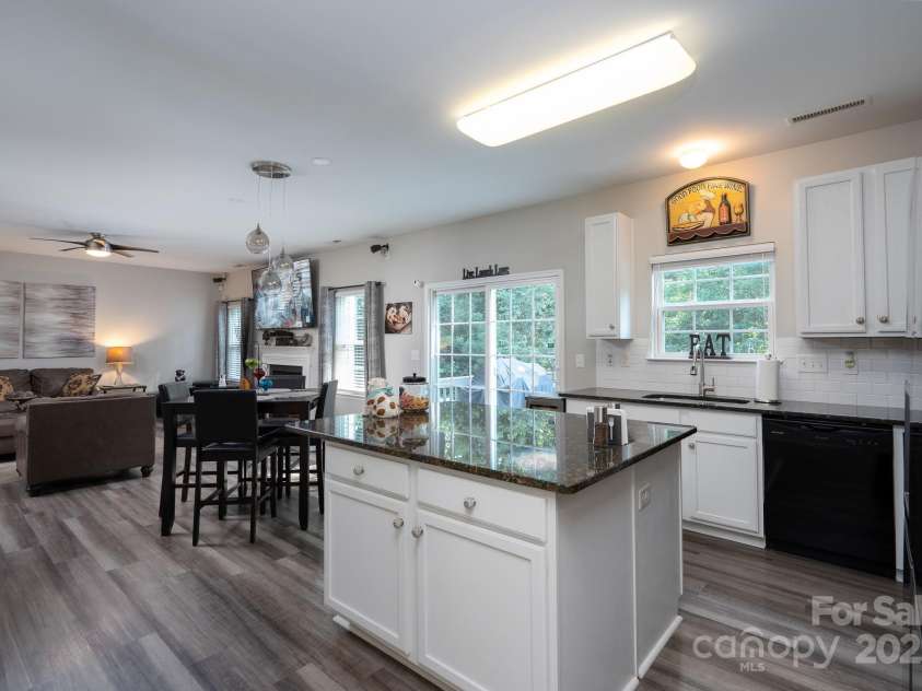 304 Augustus Lane, Mount Holly, NC 28120.  MLS# CAR4254365, YatesRealty ID 27168. Kitchen - living room