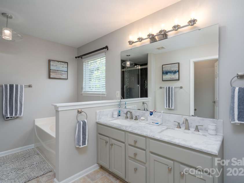 304 Augustus Lane, Mount Holly, NC 28120.  MLS# CAR4254365, YatesRealty ID 27168. Primary bathroom