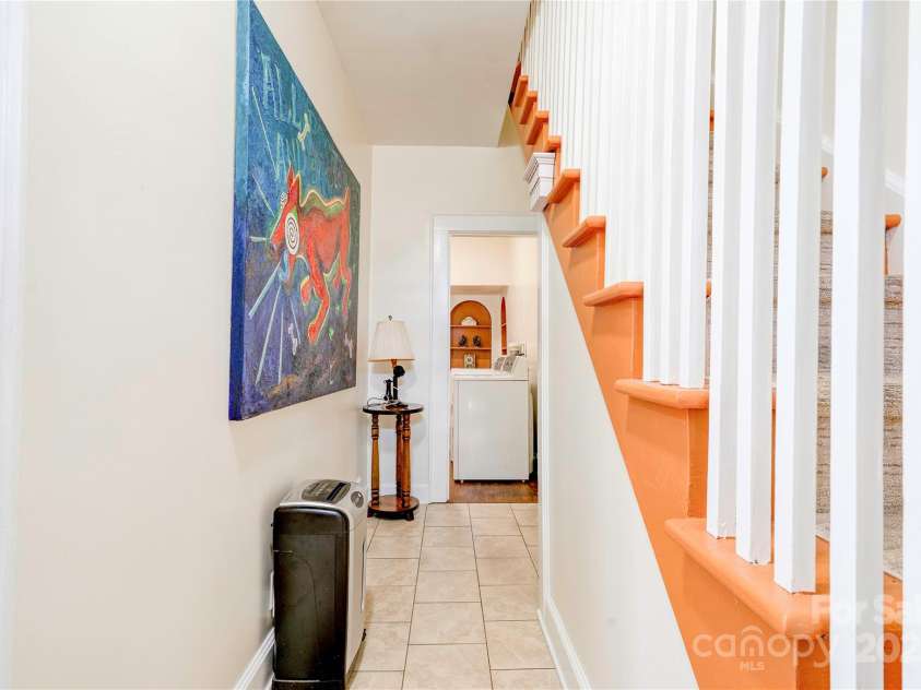 615 Warren Street, Shelby, NC 28150.  MLS# CAR4298346, YatesRealty ID 2717. Lower Level Hall/Second Staircase