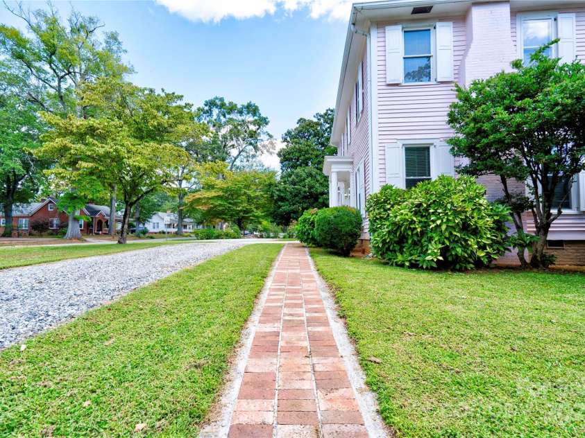 615 Warren Street, Shelby, NC 28150.  MLS# CAR4298346, YatesRealty ID 2717. Side/Walkway to front