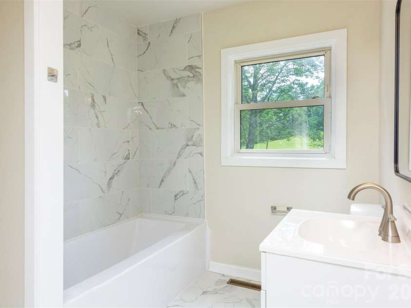 37 King Drive, Leicester, NC 28748.  MLS# CAR4384045, YatesRealty ID 27170. 