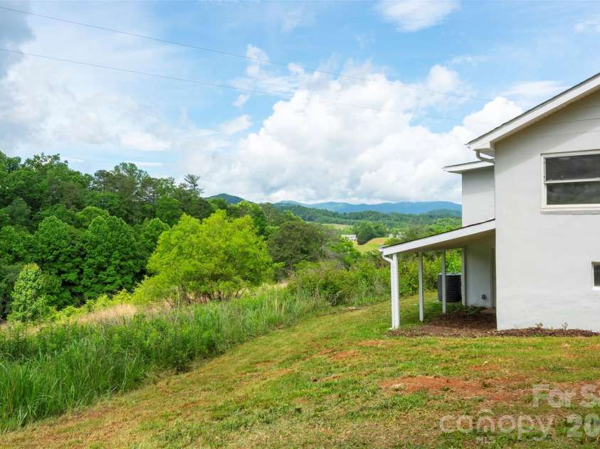 37 King Drive, Leicester, NC 28748.  MLS# CAR4384045, YatesRealty ID 27170. 