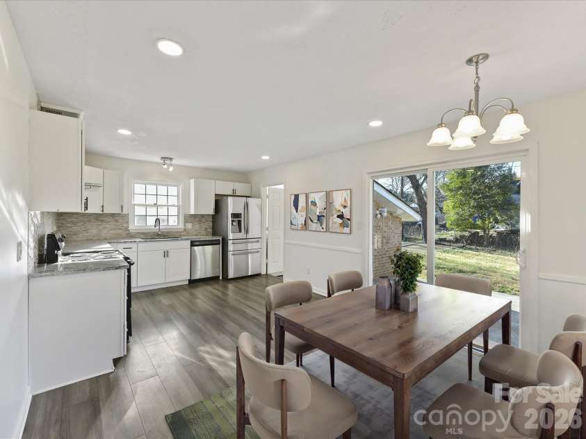 4008 Dunwoody Drive, Charlotte, NC 28215.  MLS# CAR4335406, YatesRealty ID 27172. Dining Area and Kitchen Virtually Staged