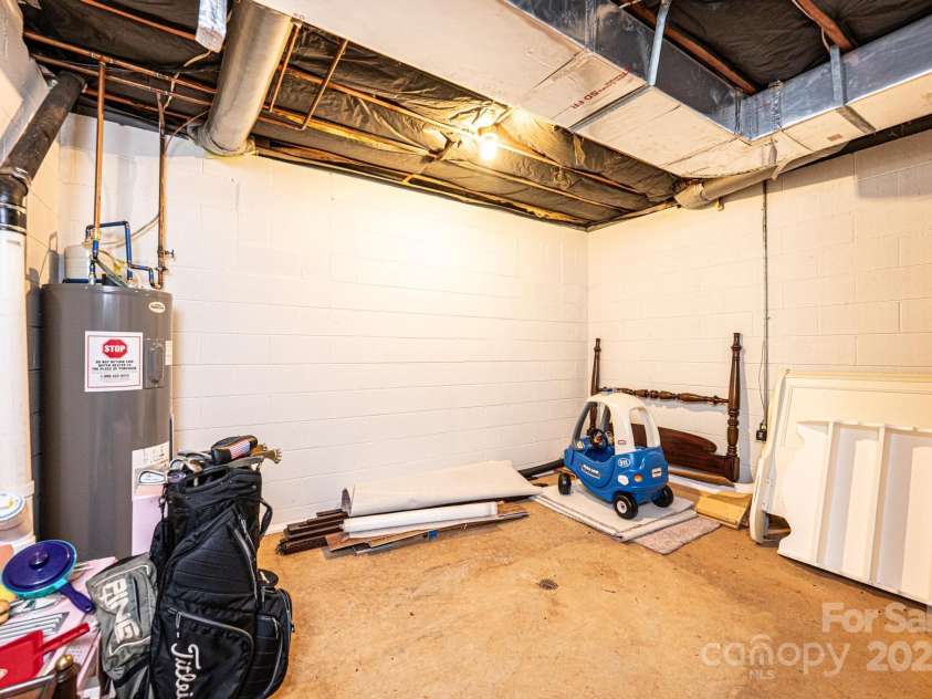 902 Cherokee Place, Lenoir, NC 28645.  MLS# CAR4277331, YatesRealty ID 27183. Basement storage