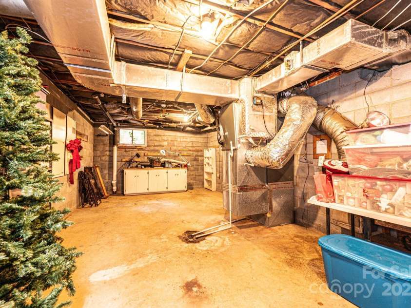 902 Cherokee Place, Lenoir, NC 28645.  MLS# CAR4277331, YatesRealty ID 27183. Basement storage