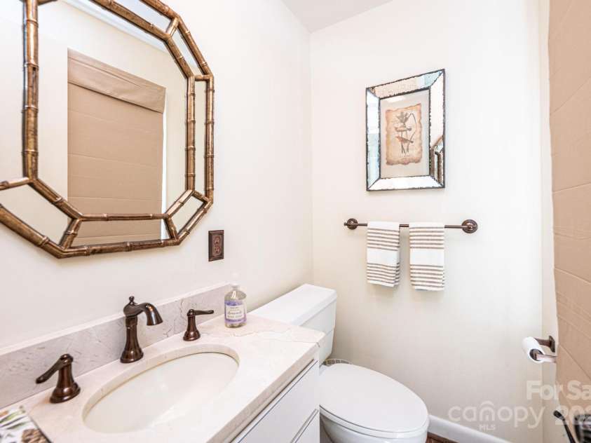 902 Cherokee Place, Lenoir, NC 28645.  MLS# CAR4277331, YatesRealty ID 27183. Half Bath on main floor bedroom area