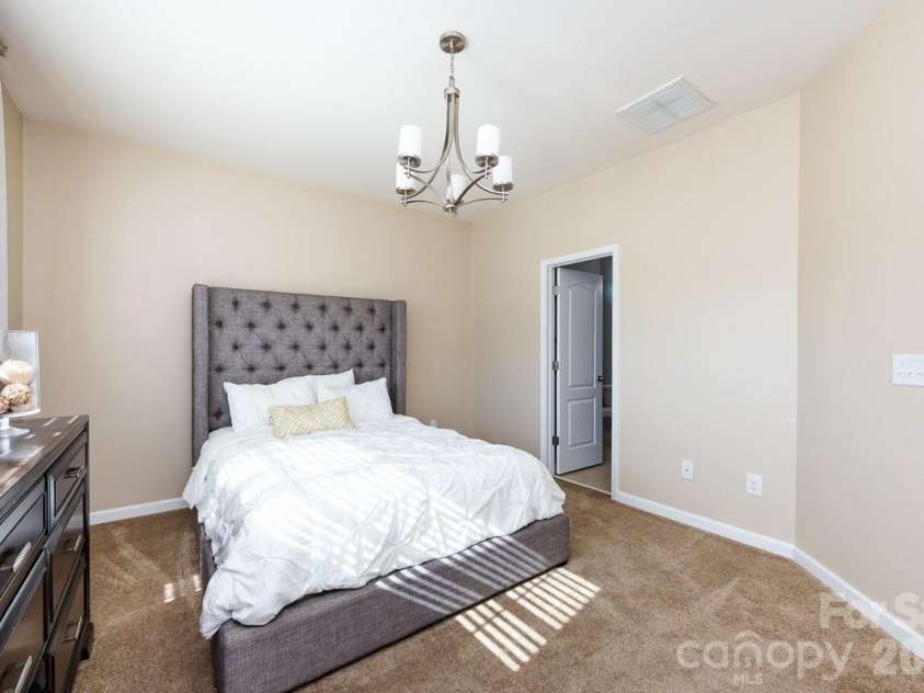 8931 Happiness Road, Harrisburg, NC 28075.  MLS# CAR4331689, YatesRealty ID 27184. Bedroom on Main