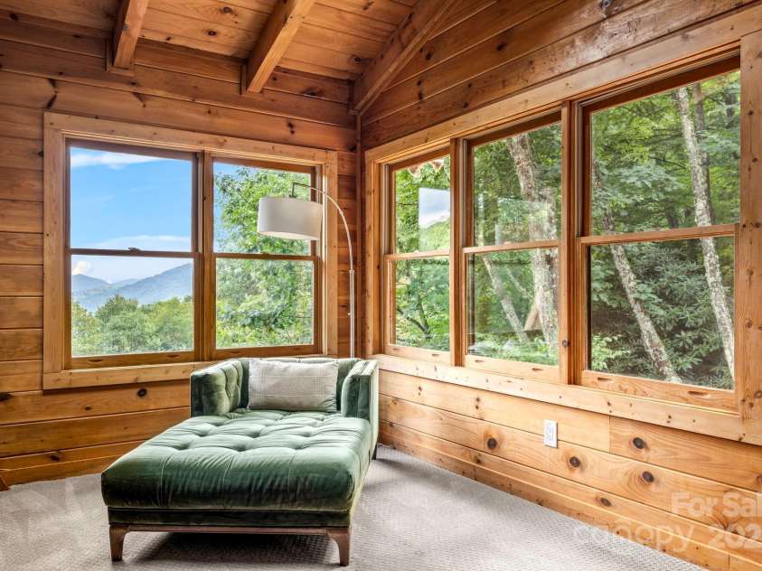 1933 Laurel Ridge Road, Maggie Valley, NC 28751.  MLS# CAR4281523, YatesRealty ID 27189. Book reading time!