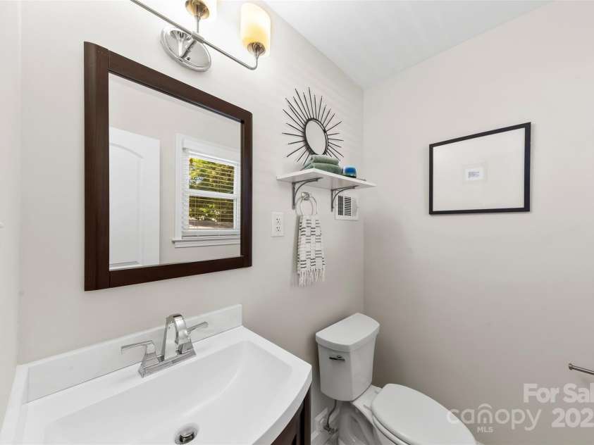 1126 Woodlawn Road, Charlotte, NC 28209.  MLS# CAR4281650, YatesRealty ID 27192. Primary ensuite half bathroom.