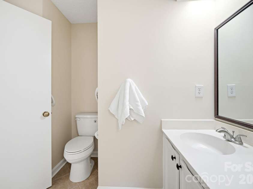 2500 #A Stradbrook Drive, Charlotte, NC 28210.  MLS# CAR4387981, YatesRealty ID 27195. Guest Bathroom 1/2 bath