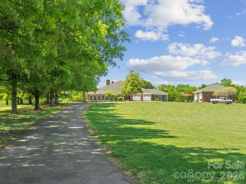 4809 US 74 Highway, Wingate, NC 28174.  MLS# CAR4388455, YatesRealty ID 27201. House view from the building on the adjacent parcel