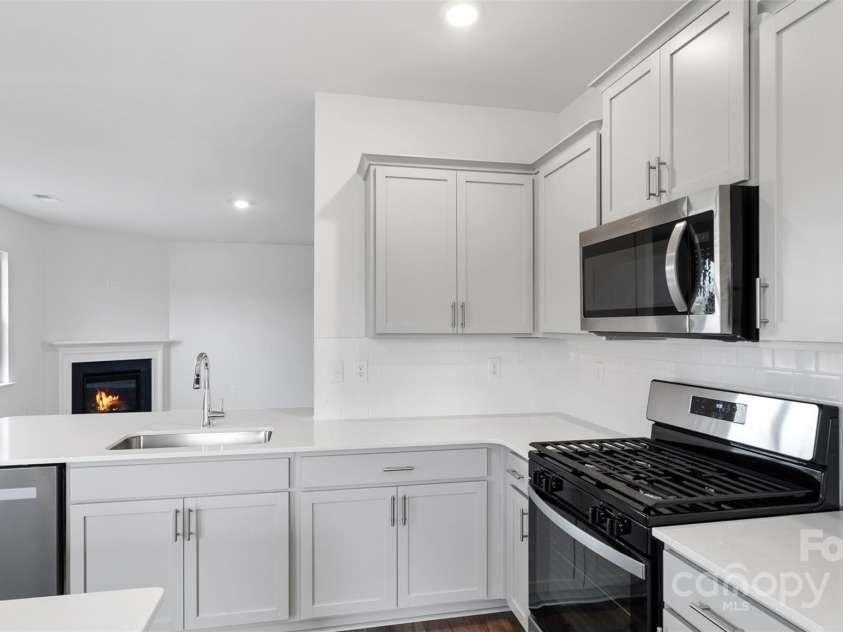 76 Bovine Branch Road, Fletcher, NC 28732.  MLS# CAR4283551, YatesRealty ID 27201. Photos are representative