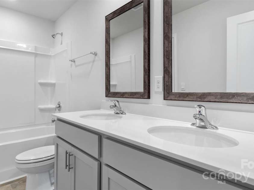 76 Bovine Branch Road, Fletcher, NC 28732.  MLS# CAR4283551, YatesRealty ID 27201. Photos are representative