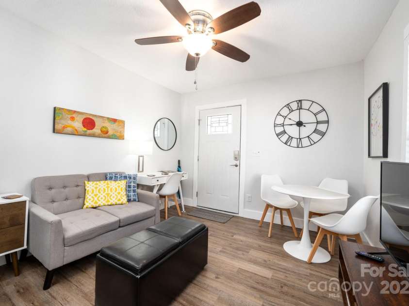 18 Oteen Park Place, Asheville, NC 28805.  MLS# CAR4282740, YatesRealty ID 27208. Unit 10-Living, Dining and Work Space