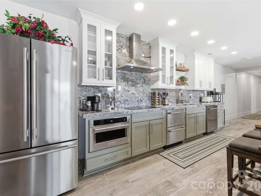 420 Skysail Road, Salisbury, NC 28146.  MLS# CAR4389093, YatesRealty ID 27209. Lower level kitchen