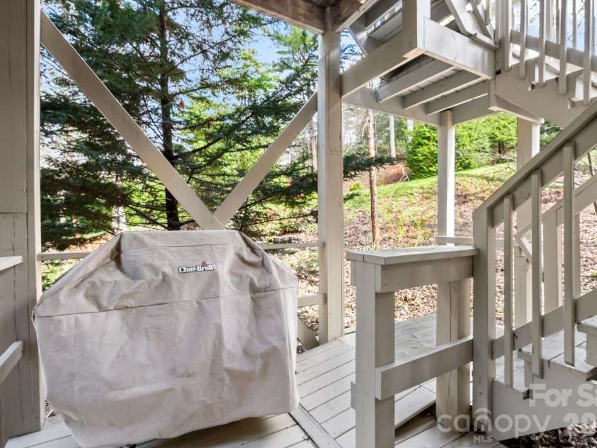 100 Thistle Knoll Court, Asheville, NC 28803.  MLS# CAR4355121, YatesRealty ID 27213. Lower level deck area