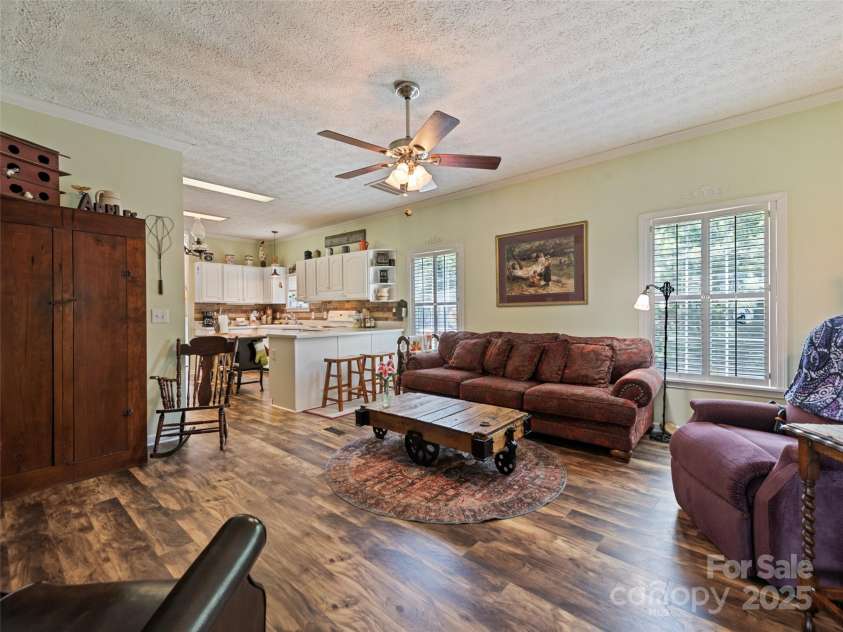 32 Perseverance Drive, Canton, NC 28716.  MLS# CAR4282125, YatesRealty ID 27213. Large den off kitchen