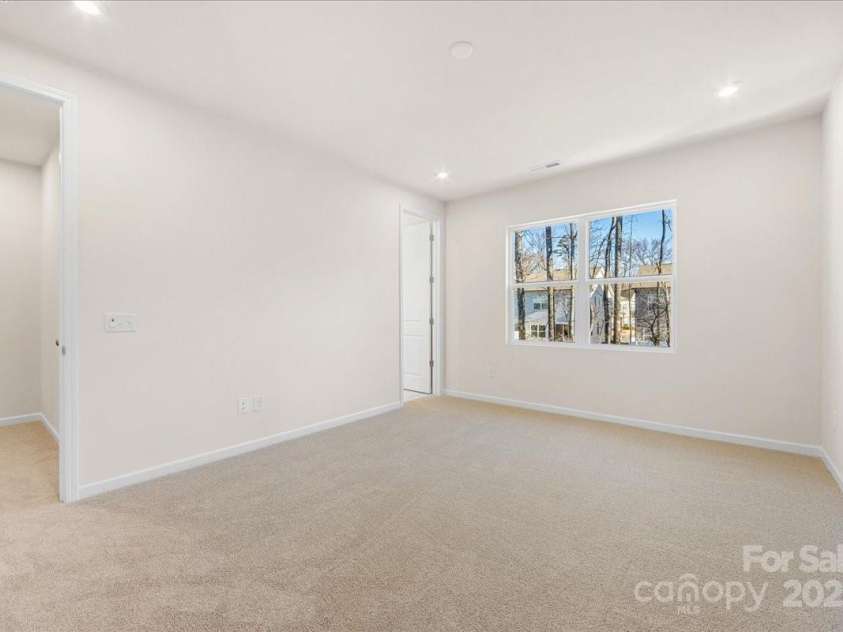 6009 Longar Lane, Charlotte, NC 28269.  MLS# CAR4283710, YatesRealty ID 27219. Primary Suite Filled with Light.