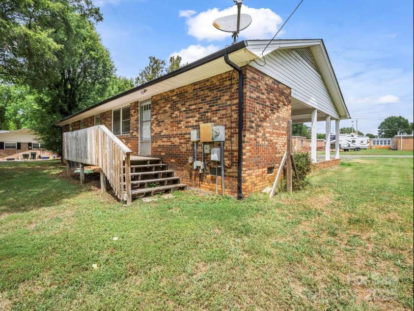 501 Weaver Street, Cherryville, NC 28021.  MLS# CAR4287583, YatesRealty ID 2722. Back has deck and entry to laundry room