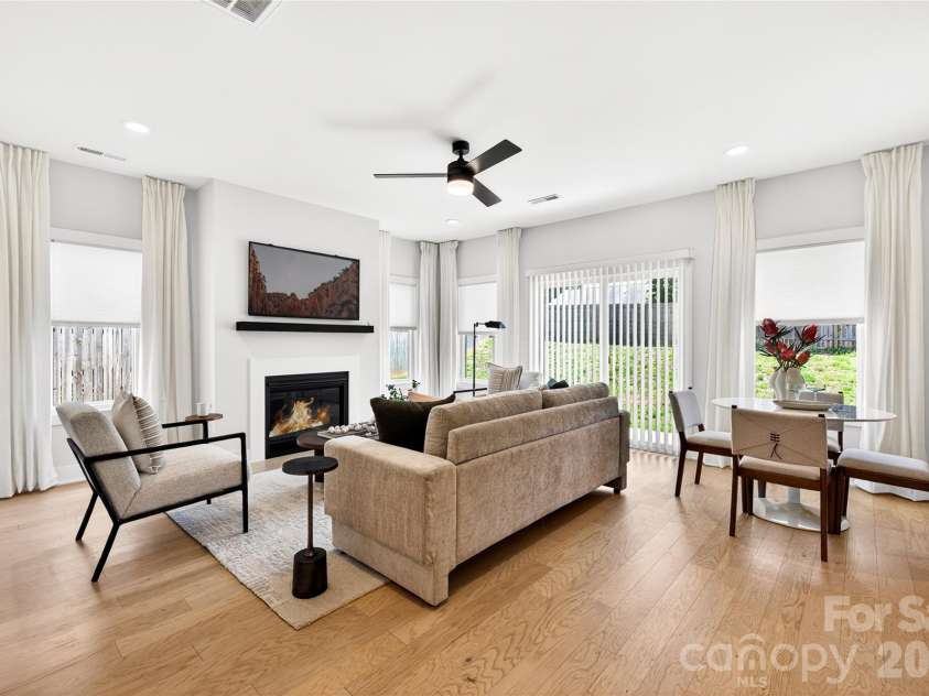 5044 Double Lakes Drive, Charlotte, NC 28212.  MLS# CAR4381424, YatesRealty ID 27220. Gas fireplace with mantle.