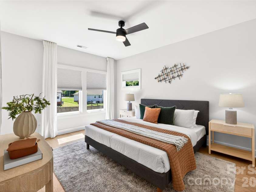 5044 Double Lakes Drive, Charlotte, NC 28212.  MLS# CAR4381424, YatesRealty ID 27220. Owner's suite features wood floors.