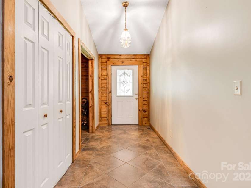 135 Logan Court, Lake Lure, NC 28746.  MLS# CAR4283853, YatesRealty ID 27226. 