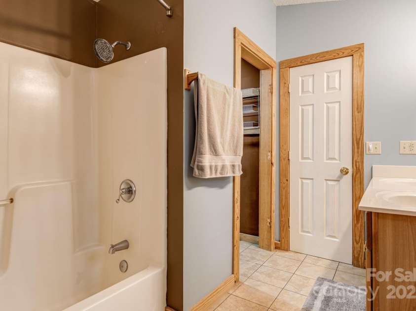 135 Logan Court, Lake Lure, NC 28746.  MLS# CAR4283853, YatesRealty ID 27226. 