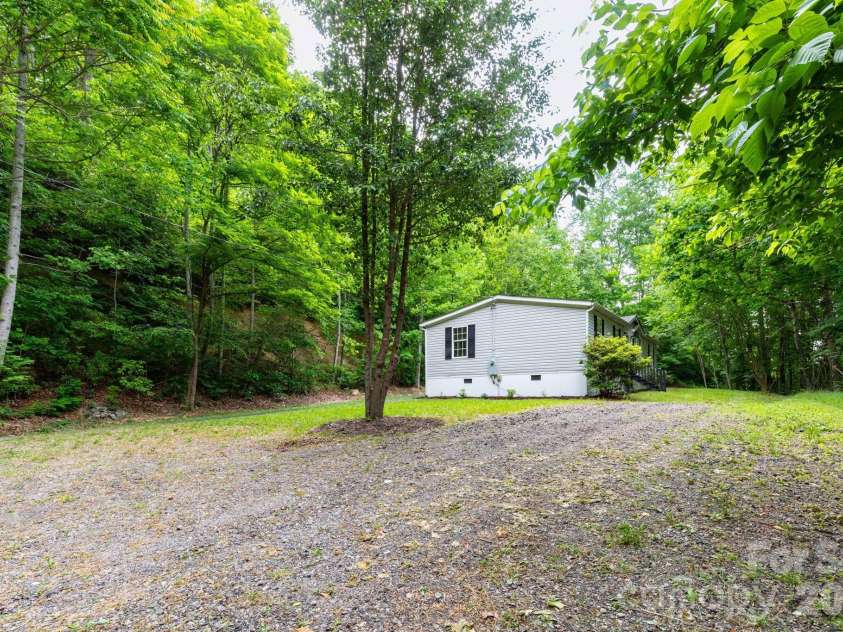 61 Blue Mountain Road, Fairview, NC 28730.  MLS# CAR4381862, YatesRealty ID 27229. Parking area. 