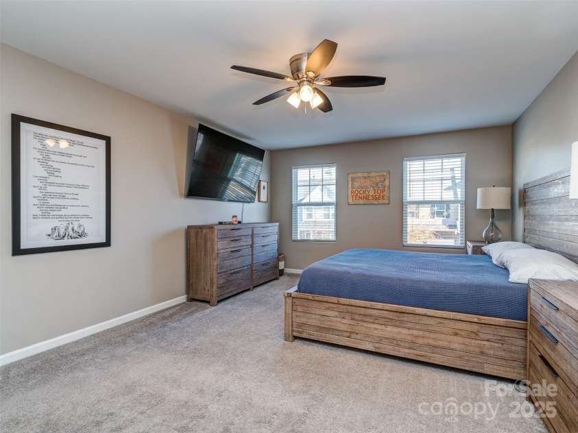 975 Bunker Trace, Rock Hill, SC 29730.  MLS# CAR4322751, YatesRealty ID 27232. Primary bedroom is on the 2nd floor, is oversized, and has custom blinds & ceiling fan.