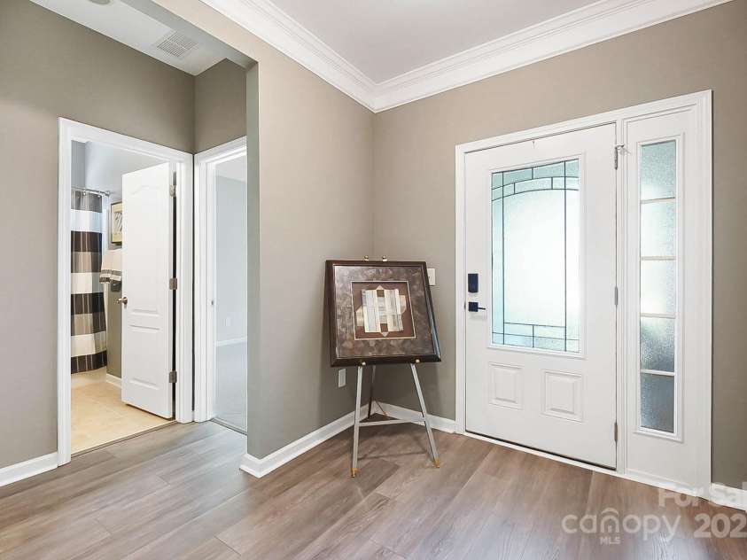 4106 Perth Road, Fort Mill, SC 29707.  MLS# CAR4280800, YatesRealty ID 27234. Foyer with 2 beds and full bath to the side.
