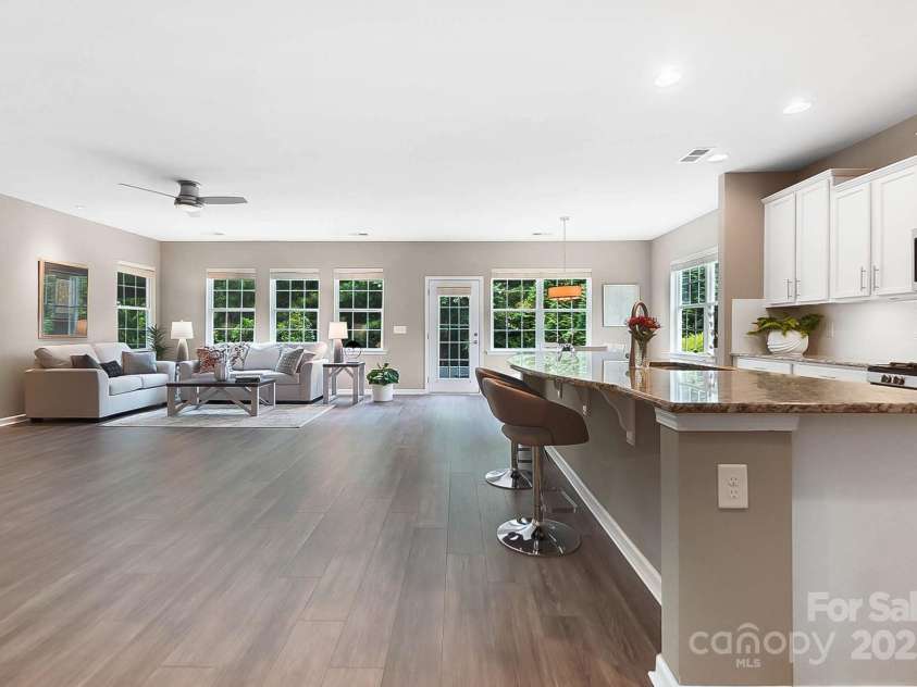 4106 Perth Road, Fort Mill, SC 29707.  MLS# CAR4280800, YatesRealty ID 27234. Long hallway passing the bedrooms and formal dining room to oversized family room!