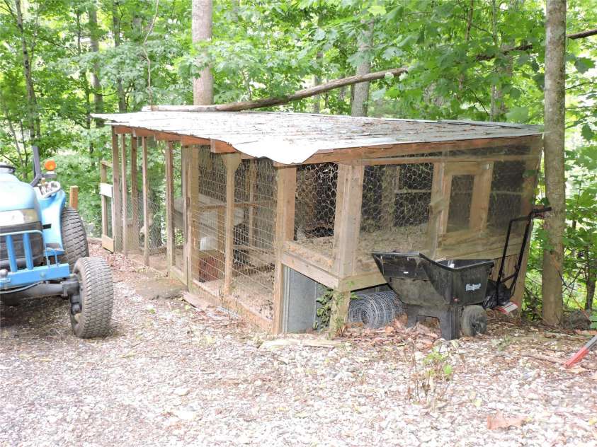 963 Melton Branch Road, Bakersville, NC 28705.  MLS# CAR4388856, YatesRealty ID 27236. Chicken coup