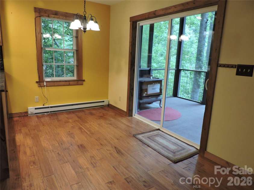 963 Melton Branch Road, Bakersville, NC 28705.  MLS# CAR4388856, YatesRealty ID 27236. Dining area