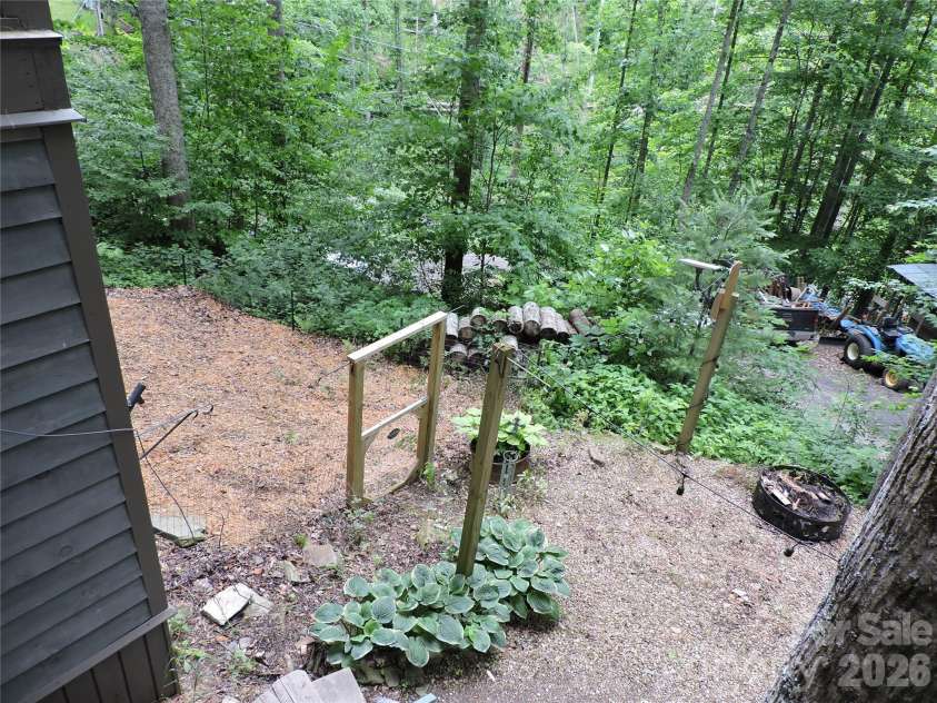 963 Melton Branch Road, Bakersville, NC 28705.  MLS# CAR4388856, YatesRealty ID 27236. Yard